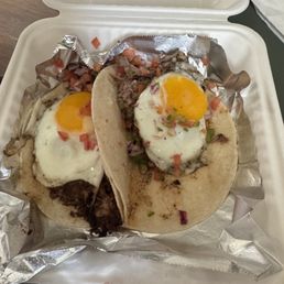 Carnitas and egg tacos