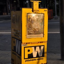 Philadelphia Weekly - a typical yellow pw box. note the orange citypaper box in the background. they're usually right near each other.