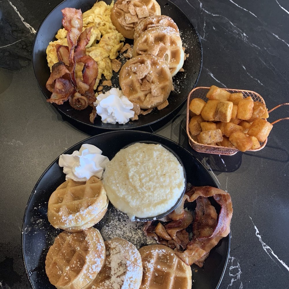 Top- Mini Waffle Platter eggs, bacon & seasoned potatoes $14 + $4 cinnamon toast waffles Bottom- Platter w/bacon & grits $14 Top- Mini Waffle Platter eggs, bacon & seasoned potatoes $14 + $4 cinnamon toast waffles Bottom- Platter w/bacon & grits $14