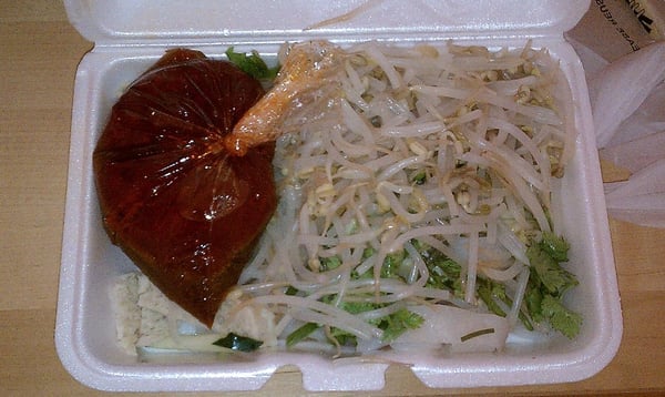 Photo of Xi'an Famous Foods - New York, NY, US. Take Out Liang Pi Noodles.  Noodles are at the bottom.  Taken July 5, 2010.