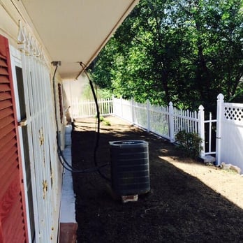 Albertos Landscape - a white house with red shutters - Landscaping Near Me - Waltham, Massachusetts