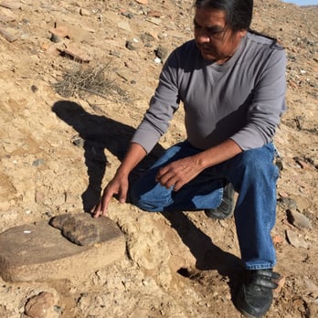Hopi Cultural Center Restaurant - My guide is showing me in ancient grinding stone - American Near Me - Second Mesa, Arizona Hopi Cultural Center Restaurant - My guide is showing me in ancient grinding stone - American Near Me - Second Mesa, Arizona