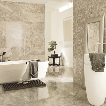 Porcelanosa - a bathroom with a bathtub and a towel rack - Kitchen & Bath Near Me - Denver, Colorado