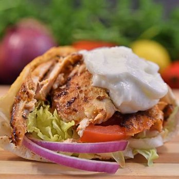 Big H Restaurant - a chicken sandwich with lettuce and tomatoes - Middle Eastern Near Me - Ottawa, Ontario