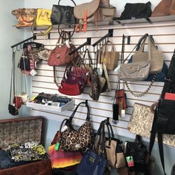 Between Friends Consignment - Good selection of handbags from vintage to Vera Bradley.