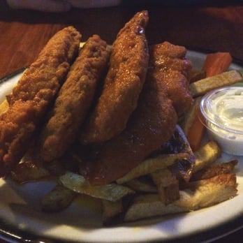 Gene McCarthy's - Chicken fingers with medium sauce and fries - American Near Me - Buffalo, New York Gene McCarthy's - Chicken fingers with medium sauce and fries - American Near Me - Buffalo, New York