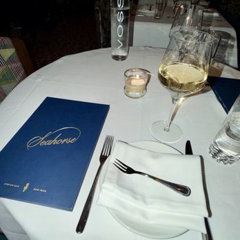 Seahorse - Table by the bar, side of champagne. - Seafood Near Me - New York, New York Seahorse - Table by the bar, side of champagne. - Seafood Near Me - New York, New York