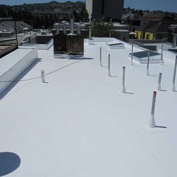 Tom Lee Roofing - Roof installed in tandem with Solar City.  The poles are stanchions to mount the panels. - Roofing Near Me - Daly City, California