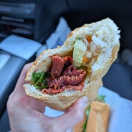 Inside of grilled pork banh mi Inside of grilled pork banh mi
