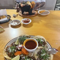 Molcajete, carne Asada, carnitas, lengua, and birria tacos
