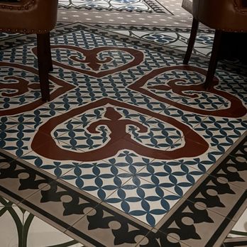 Tillie's - Beautiful tiles with the Camp Lucy logo - New American Near Me - Dripping Springs, Texas Tillie's - Beautiful tiles with the Camp Lucy logo - New American Near Me - Dripping Springs, Texas