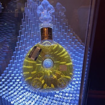 Rib N Reef - a bottle of tequila in a display case - Steakhouses Near Me - Montreal, Quebec Rib N Reef - a bottle of tequila in a display case - Steakhouses Near Me - Montreal, Quebec