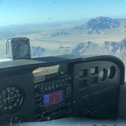 Marana Flight Schools - Cessna 172 over the desert