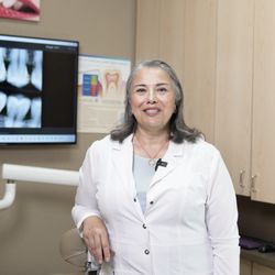 Orangecrest Family Dental - Reviewing digital X-rays chairside. We show you what we see before we recommend anything.