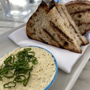 Canon - Sourdough Toast with Elote Spread - Cocktail Bars Near Me - Sacramento, California Canon - Sourdough Toast with Elote Spread - Cocktail Bars Near Me - Sacramento, California