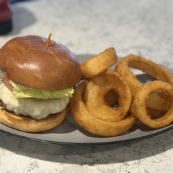 TJ’s Sport Tavern - Cheeseburger with Onion Rings. Homemade ranch.