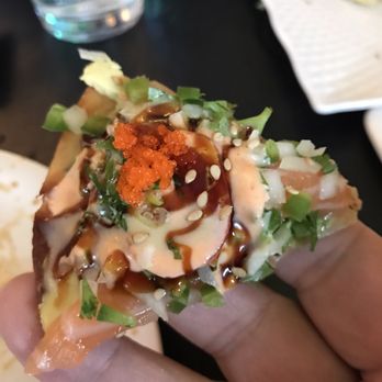 Sushiman - Closeup of One piece of the Salmon Pizza - Sushi Bars Near Me - Huntingdon Valley, Pennsylvania Sushiman - Closeup of One piece of the Salmon Pizza - Sushi Bars Near Me - Huntingdon Valley, Pennsylvania
