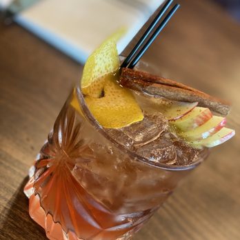 Monarch Kitchen & Bar - a drink with chopsticks - American Near Me - Davenport, Iowa