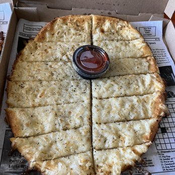 The Pizza Press - Celebration - Garlic Cheesy Bread - Pizza Near Me - Kissimmee, Florida The Pizza Press - Celebration - Garlic Cheesy Bread - Pizza Near Me - Kissimmee, Florida