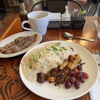 Lucky's Cafe - Their famous cheddar biscuits with gravy and scrambled eggs, pecan bacon undercooked - Coffee & Tea Near Me - Cleveland, Ohio