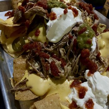 Tropics Restaurant & Craft House - Kalua Pig Nachos - Sports Bars Near Me - Honolulu, Hawaii Tropics Restaurant & Craft House - Kalua Pig Nachos - Sports Bars Near Me - Honolulu, Hawaii