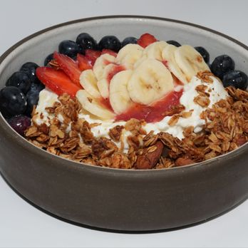 White Noise Coffee - Coffee Shop & Roastery - A healthy Greek yogurt granola bowl topped with fresh banana, strawberry, blueberry, and house-made granola, served at White ... - Coffee & Tea Near Me - New York, New York White Noise Coffee - Coffee Shop & Roastery - A healthy Greek yogurt granola bowl topped with fresh banana, strawberry, blueberry, and house-made granola, served at White ... - Coffee & Tea Near Me - New York, New York