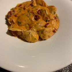 Piccolina Toscana - Tortellini: Fresh pasta rolled with finely ground mortadella ham and ricotta tossed in a sun-dried tomato cream sauce