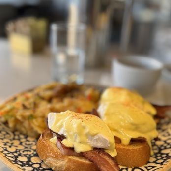 The Goldfinch - When charging the Tesla grab yourself eggs Benedict with bacon - New American Near Me - Irvine, California