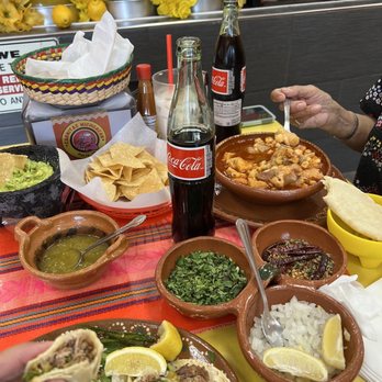 Carnitas Michoacan - a table full of mexican food - Mexican Near Me - Rialto, California Carnitas Michoacan - a table full of mexican food - Mexican Near Me - Rialto, California
