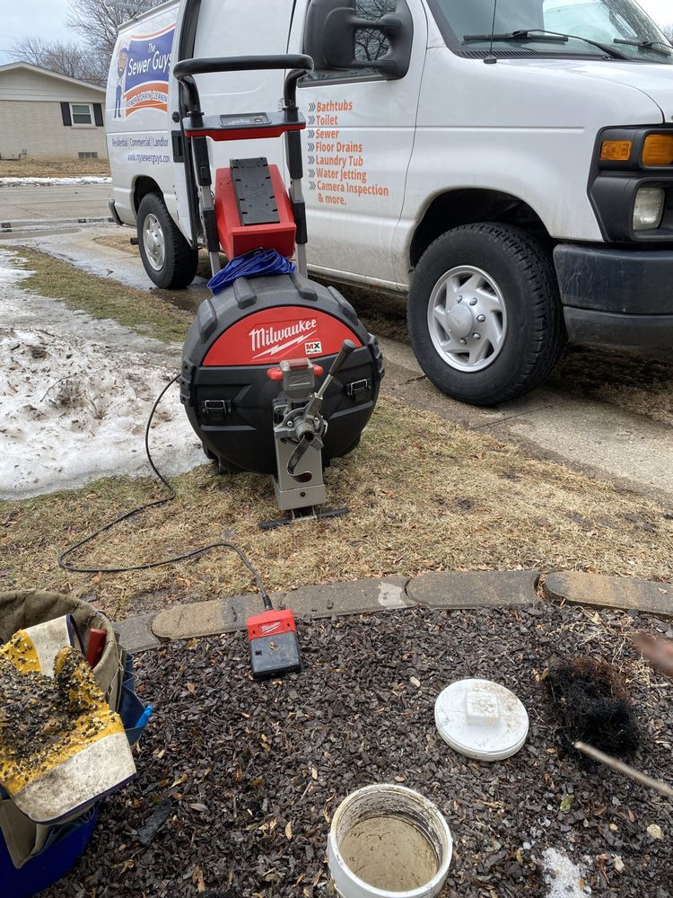 Slide of The Sewer Guys