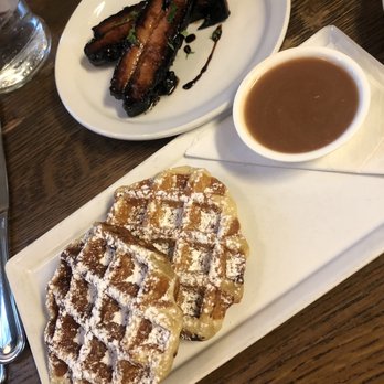 Medina Cafe - leige waffles with raspberry caramel sauce & side of thick bacon - Breakfast & Brunch Near Me - Vancouver, British Columbia