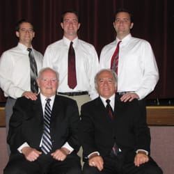 Poole Chiropractic - (left to right): Adam Poole, D.C., Aaron Poole, M.D., Eric Poole D.C., (bottom row) Leland Poole, D.C., Dennis Poole, D.C.