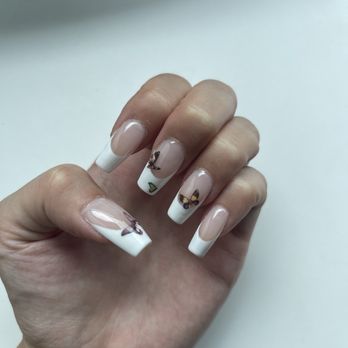 Natural Nail & Spa - Gel X French Tips with Butterfly stickers - Nail Salons Near Me - Los Angeles, California Natural Nail & Spa - Gel X French Tips with Butterfly stickers - Nail Salons Near Me - Los Angeles, California