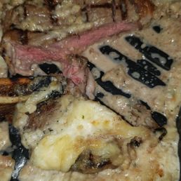 We ordered a parmesan encrusted ribeye. Any time I have ordered something encrusted it is just around the end. We ordered a parmesan encrusted ribeye. Any time I have ordered something encrusted it is just around the end.