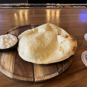 Lumi Restaurant - Puffy bread with Hummus - Mediterranean Near Me - Minneapolis, Minnesota Lumi Restaurant - Puffy bread with Hummus - Mediterranean Near Me - Minneapolis, Minnesota