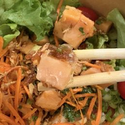 Frozen salmon cube in the poke bowl.