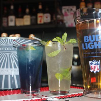 Sunset Patio Bar - a glass of bud light next to a glass of lemonade - Pubs Near Me - Henderson, Nevada Sunset Patio Bar - a glass of bud light next to a glass of lemonade - Pubs Near Me - Henderson, Nevada