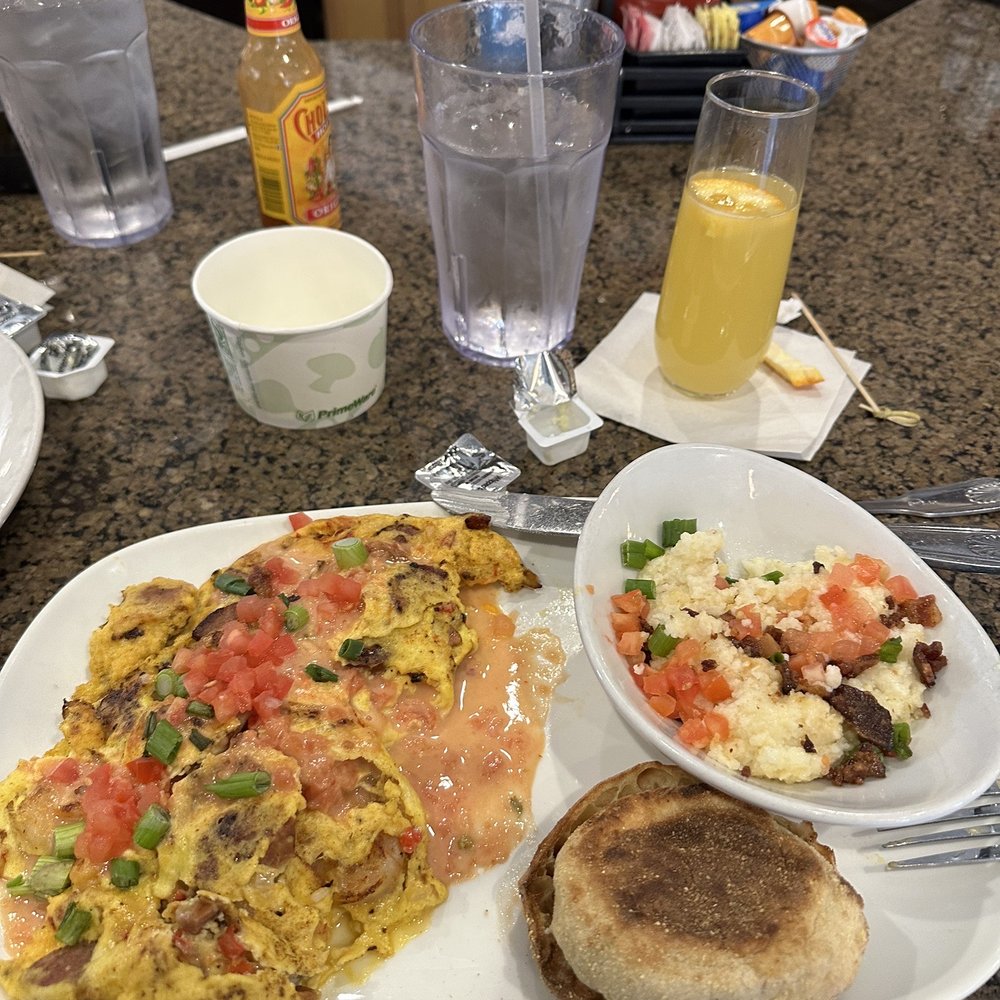 Another Broken Egg Cafe - Mardi Gras Omelette with city grits - Breakfast & Brunch Near Me - Jacksonville, Florida