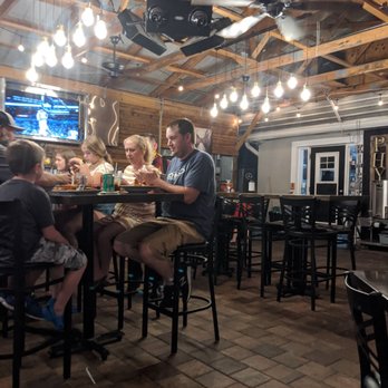 Phyre Brewery & Tavern - These guests are eating some of Phyre's food. - Speakeasies Near Me - St. Cloud, Florida Phyre Brewery & Tavern - These guests are eating some of Phyre's food. - Speakeasies Near Me - St. Cloud, Florida