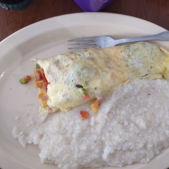 Just Us Cafe - Ultimate, farmers and I had ham and cheese omelette. Came with grits or hash browns and toast or biscuit. - Cafes Near Me - Cayce, South Carolina Just Us Cafe - Ultimate, farmers and I had ham and cheese omelette. Came with grits or hash browns and toast or biscuit. - Cafes Near Me - Cayce, South Carolina