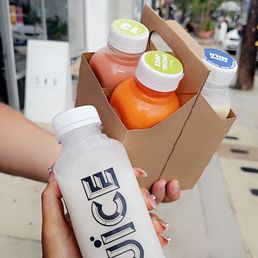 Coconut meat blended with coconut water, carrot juice, strawberry and apple, almond milk with dates vanilla and coconut