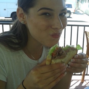 Izzy's Cafe - Granddaughter Jazzy chomping on Izzy's deli brisket. She's going to hate this photo of her! - Barbeque Near Me - El Cajon, California Izzy's Cafe - Granddaughter Jazzy chomping on Izzy's deli brisket. She's going to hate this photo of her! - Barbeque Near Me - El Cajon, California
