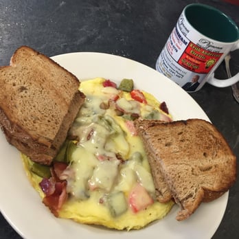 Pignone's Café - Frittata with Swiss cheese and bacon cheese, with wheat (dry) toast. - Breakfast & Brunch Near Me - Stoneham, Massachusetts Pignone's Café - Frittata with Swiss cheese and bacon cheese, with wheat (dry) toast. - Breakfast & Brunch Near Me - Stoneham, Massachusetts