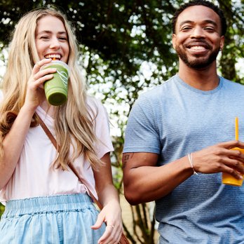 Jamba - a man and a woman holding drinks - Juice Bars & Smoothies Near Me - West Valley City, Utah Jamba - a man and a woman holding drinks - Juice Bars & Smoothies Near Me - West Valley City, Utah