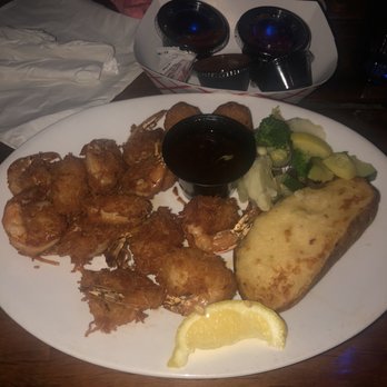 Pompano Joe's - Coconut Shrimp with a Twice - baked Potato - Seafood Near Me - Destin, Florida Pompano Joe's - Coconut Shrimp with a Twice - baked Potato - Seafood Near Me - Destin, Florida