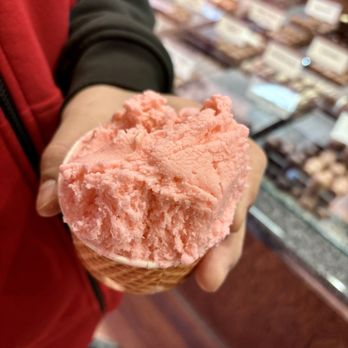 Chocolaterie Stam - Omaha - a person holding a cone of ice cream - Chocolatiers & Shops Near Me - Papillion, Nebraska Chocolaterie Stam - Omaha - a person holding a cone of ice cream - Chocolatiers & Shops Near Me - Papillion, Nebraska