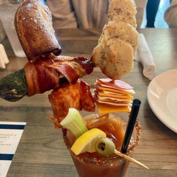 Queens South Bar and Grill - My stacked Bloody Mary that came with a pretzel nugget, a jalapeño poppers, a chicken wing, a garlic knot, and meat & cheese charcuterie! - Sports Bars Near Me - Waxhaw, North Carolina Queens South Bar and Grill - My stacked Bloody Mary that came with a pretzel nugget, a jalapeño poppers, a chicken wing, a garlic knot, and meat & cheese charcuterie! - Sports Bars Near Me - Waxhaw, North Carolina