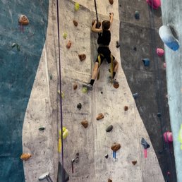 Climbing wall with auto-belay Climbing wall with auto-belay