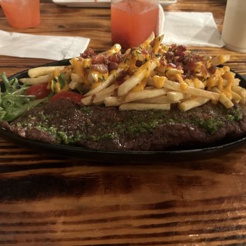 El Pilón Loko Restaurant - Churrasco with side of loaded fries and salad - Puerto Rican Near Me - Winter Haven, Florida