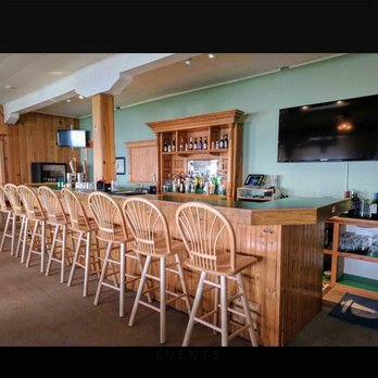 Lahey's Pub - a bar with wooden chairs - Pubs Near Me - Onekama, Michigan Lahey's Pub - a bar with wooden chairs - Pubs Near Me - Onekama, Michigan